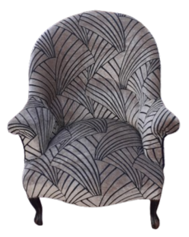 Fauteuil gris à motifs géométriques noirs