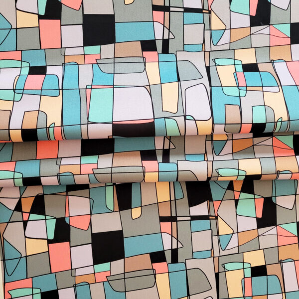Tissu de tapisserie coloré avec des formes géométriques